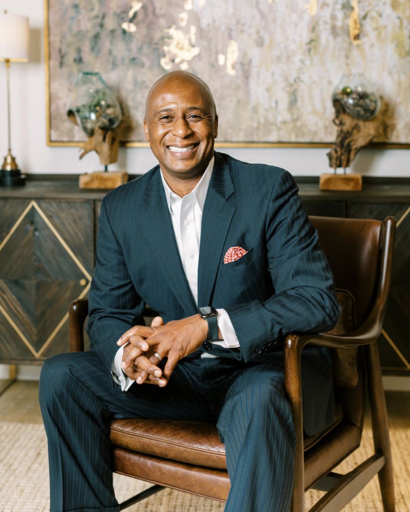Dr. Samuel Jones seated in an executive setting