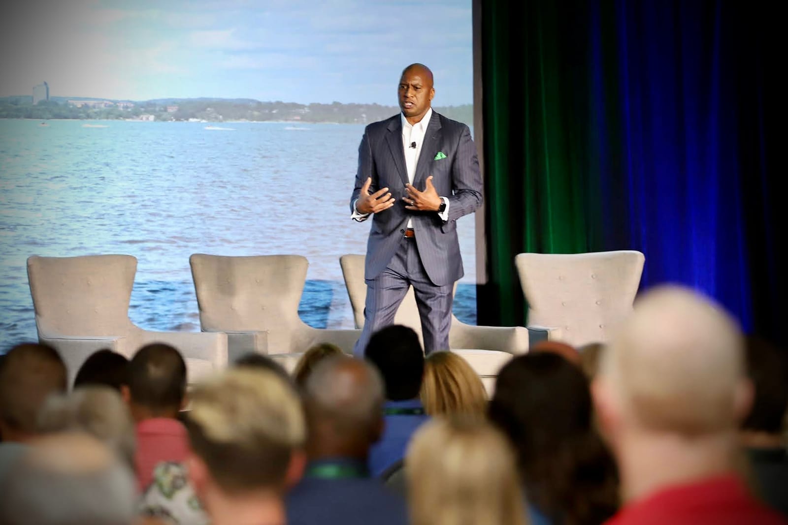 Dr. Samuel Jones speaking to an engaged audience